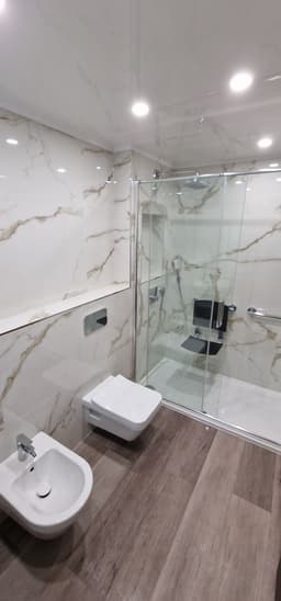 Three-Bathroom House with Wall-Mounted Suites, a Bathroom project by Lateres, Blackburn with Darwen (image 10 of 17)