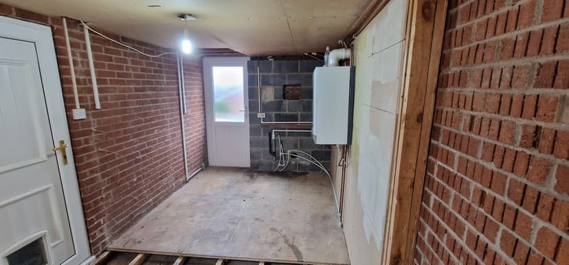 Garage to Sitting Room and Kitchenette Conversion, a Conversion project by Lateres, Blackburn with Darwen