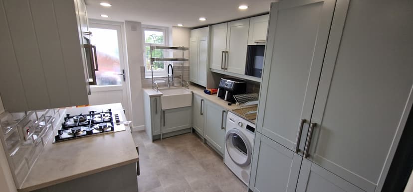Garage to Sitting Room and Kitchenette Conversion, a Conversion project by Lateres, Blackburn with Darwen